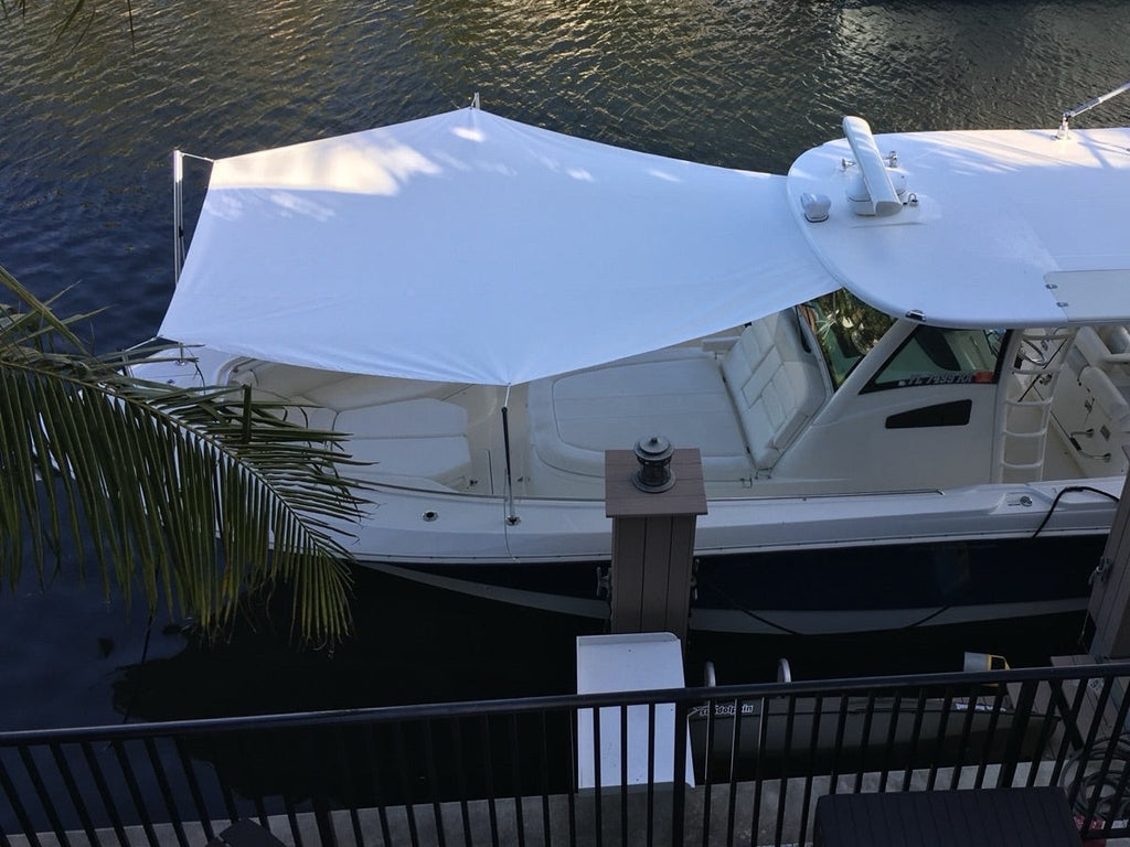 Overhead view of a custom sun shade giving full bow coverage at the dock