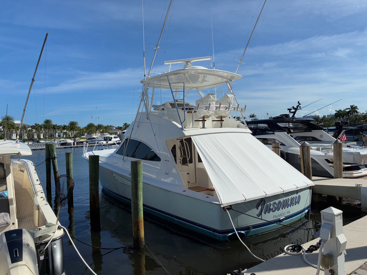 Custom white Sunshade shading the cockpit of a Viking sport fisher at the dock in Fajardo, Puerto Rico